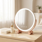 LED vanity mirror on a bedroom dresser with warm lighting