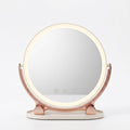 Rotatable LED vanity mirror on white background