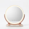 Rotatable LED vanity mirror on white background