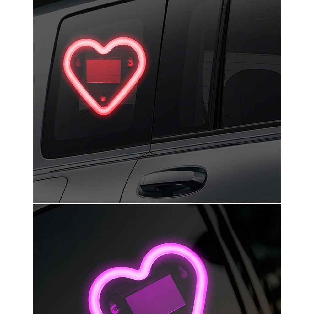Heart LED Car Light mounted on car window at night