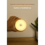 Hand-held LED induction night light — portable and lightweight