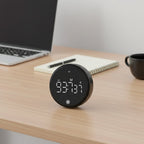 Black magnetic desk timer on minimalist workspace - focus timer