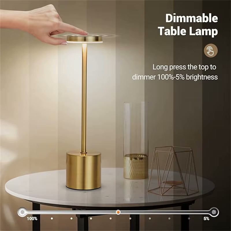 Gold dimmable touch lamp on white round table — long press top to dim 100 percent to 5 percent brightness demonstration