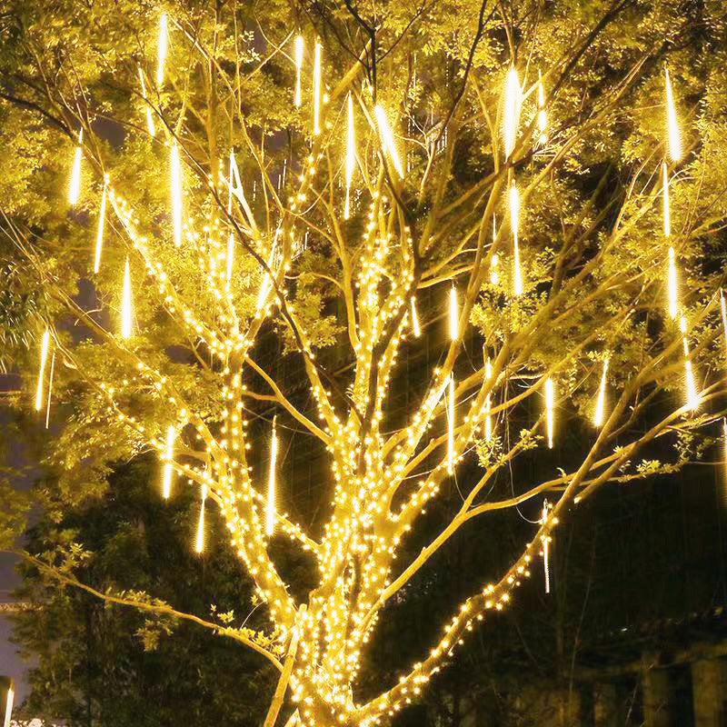 solar meteor shower lights outdoor - warm white on garden tree lifestyle