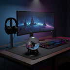 Black ferrofluid lamp on gaming desk setup - RGB keyboard background
